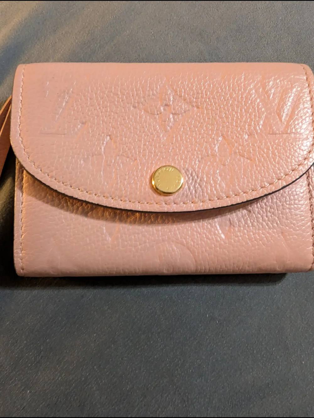 Louis Vuitton Rosalie Coin Purse crafted in Rose Poudre pink Monogram Empreinte
